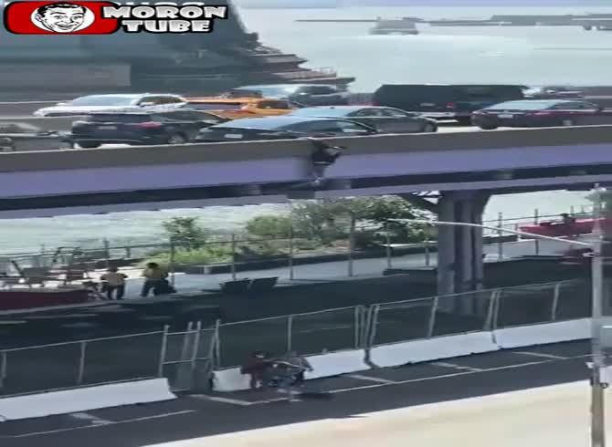 Video :He makes the foolish decision to leap from a bridge in an attempt to get away!